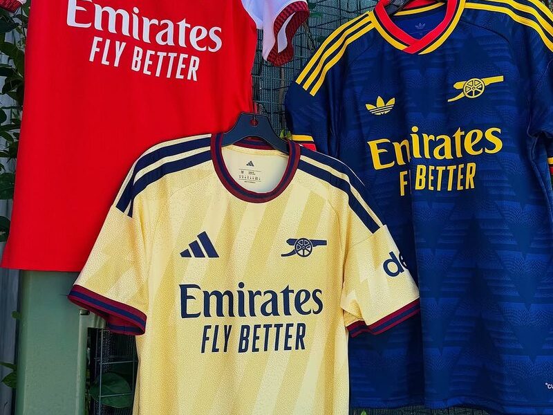 Arsenal jerseys hanging in the Pele Soccer collection